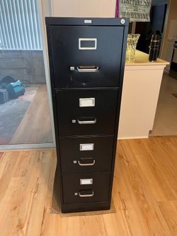 Four drawer metal filing cabinet