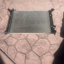 I have this radiator for a 2013 Chevy Silverado. It's used and new, and costs $415 + tax. I'm asking $175 for it. It's semi-new.