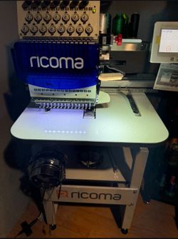 Racoma embroidery