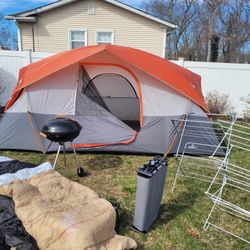 Camping 8 person tent, 2 cots, 2 sleeping bags, 2 dry racks, charcoal BBQ