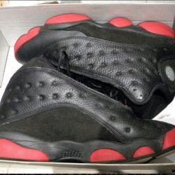 Black and red team Jordan's Sneakers 