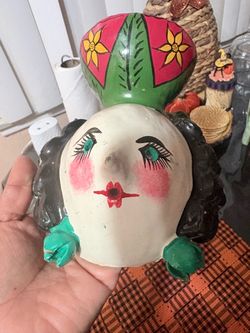 vintage Mexican folk art mask wall hanging, which is hand-fashioned from a real coconut shell husk. Originating primarily from the state of Guerrero,