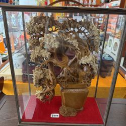 Decorative Wood Sculpture in Glass Case