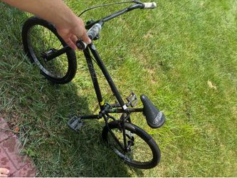 Black and green BMX Bike
