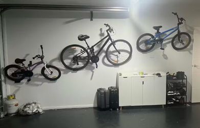 3 Bike risers / hooks for walls