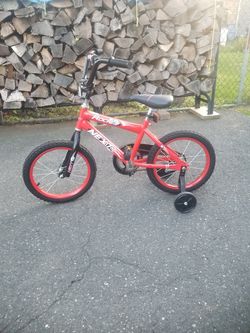 Next rocket kids bike with training wheels included!! $70/OBO