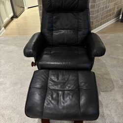 Benchmaster Leather Recliner And Ottoman