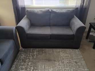 smoke gray sofa and love seat