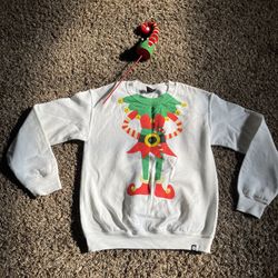 CHRISTMAS  SWEATSHIRT.  $5 