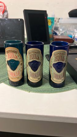 Three nice blue corralejo branded shot glasses