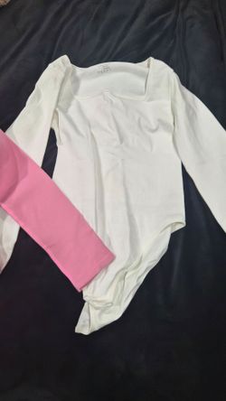 Pink& white long sleeve bodysuit.