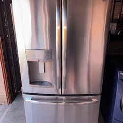 GE Stainless Steel Refrigerator And Freezer