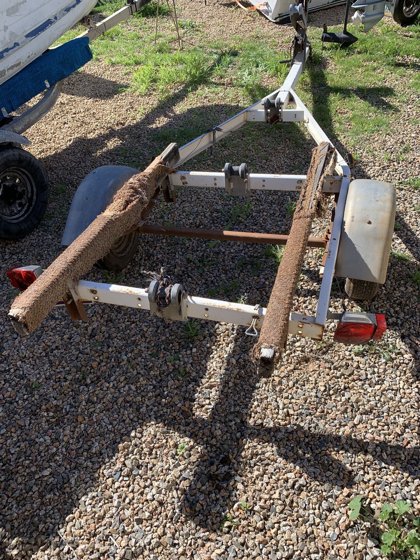 1975 Dilly 14’ small boat trailer with CLEAR TITLE. Needs work. It IS towable.