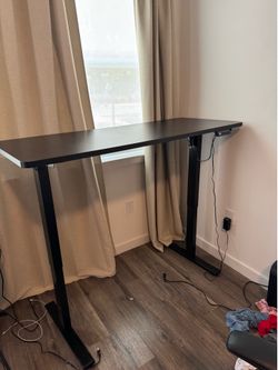 Standing/adjustable black electronic desk