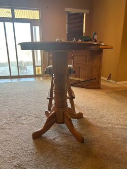 Oak Pub Table and Swivel Bar Stools