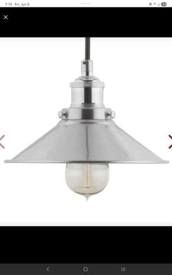Industrial pendant light has a brushed nickel finish. Adjustable height is 8 to 100 inches. Light uses an E26 base bulb with 60W max. UL Listed. Shade