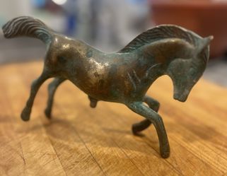 Bronze horse figurine with verdigris patina