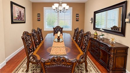 Elegant Dinning Table with 8 chairs and matching Buffet