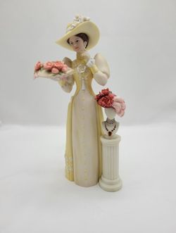 Avon Porcelain Statue