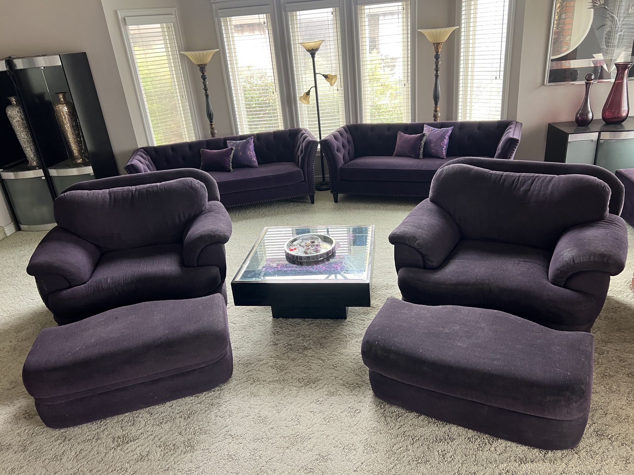 Set of two lounge chairs with ottomans