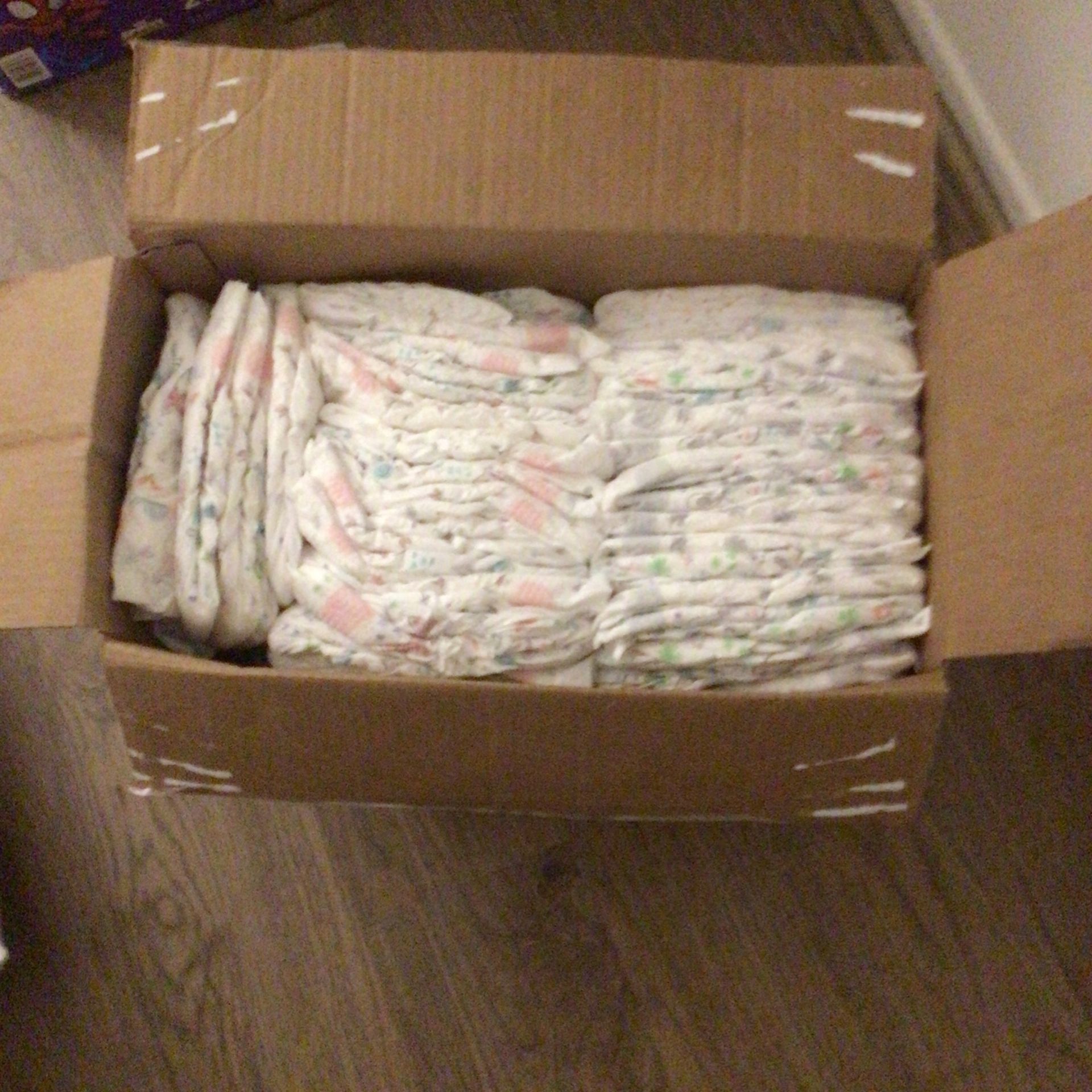 FREE Box Of Size 4 Diapers. Open But Not Used.