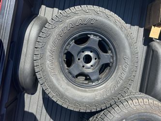 Chevy Wheels And Tires Like New.