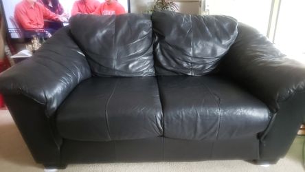 Genuine Leather loveseat minor tear excellent shape