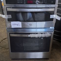 NEW GE 27 INCH MICROWAVE OVEN BUILT IN STAINLESS STEEL