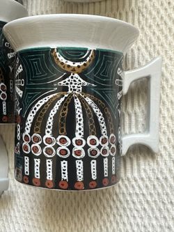 Tea Cups “Magic city” Susan Williams Ellis