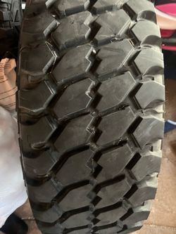 2010. -2014 ford raptor rims and tires 37 ins