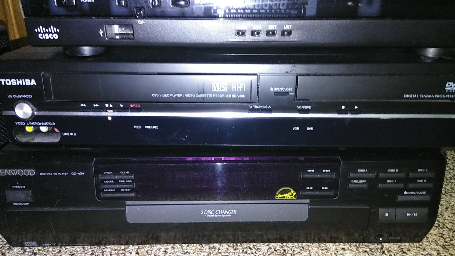 Kenwood 5 disc changer, Toshiba VHS/DVD, Cisco additional channels