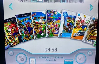 NINTNEO WII + 500 WII and GAMECUBE GAMES