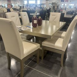 7 PIECE DINING ROOM SET Includes: 1 dining table, 6 Swivel dining chairs.
