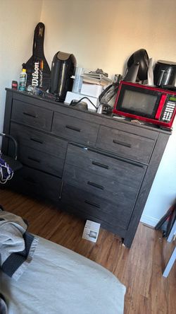 Large Black Wood Dresser with Multiple Drawers