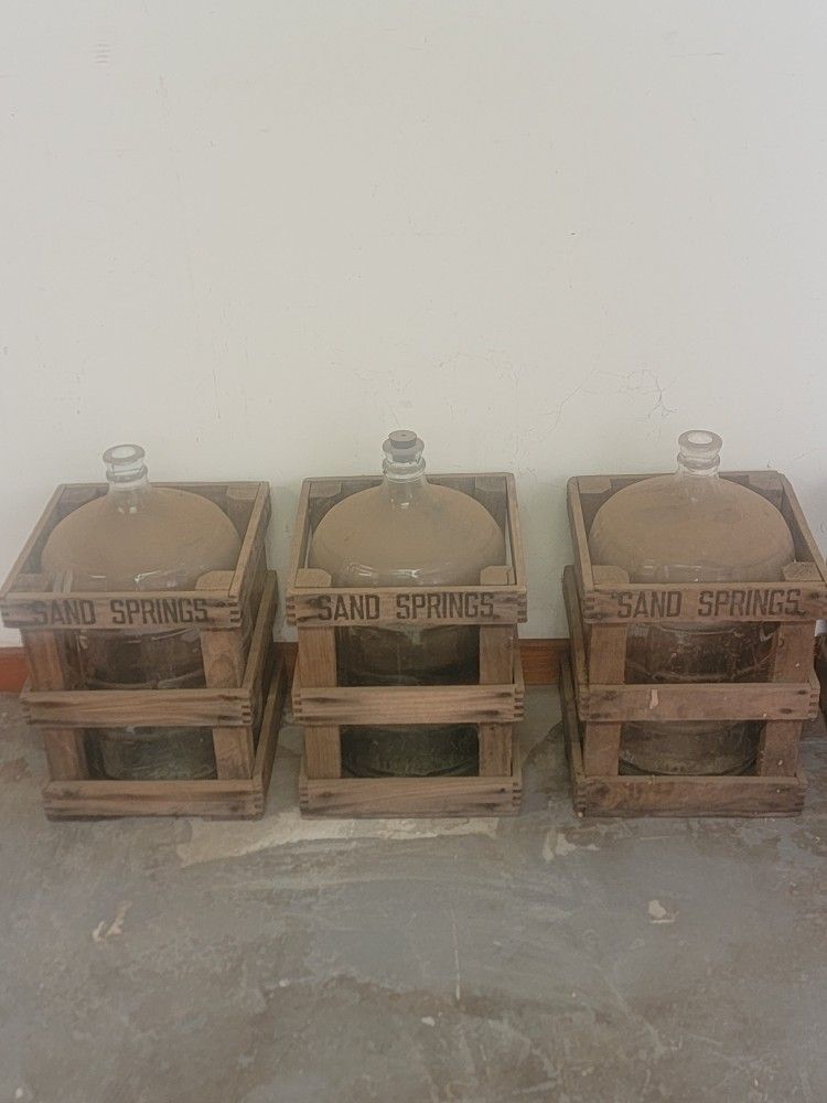 Vintage “Sand Springs” Glass Water Jugs in Original Wood Crates
Vintage “Sand Springs” Glass Water Jugs in Original Wood Crates