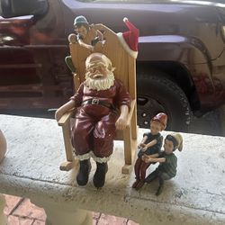 SANTA MUSICAL STATUE $100