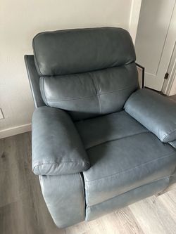 Gray leather Recliner purchased 3 months ago.