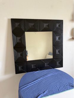 Large black wall mirror
