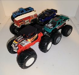 lot of 5 diecast Monster Trucks vehicles cars Hot Wheels or similar