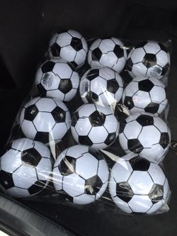 1 dozen small bouncy soccer balls