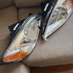 06 Ford Taurus New Headlight Assembly  