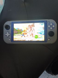Nintendo Switch Lite Comes With a SD 128 gb Card & screen protector