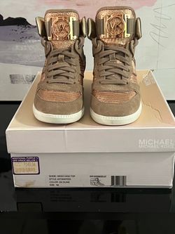 Michael Kor High top sneakers  Size: 7