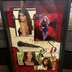 Signed Selena Gomez microphone in shadowbox