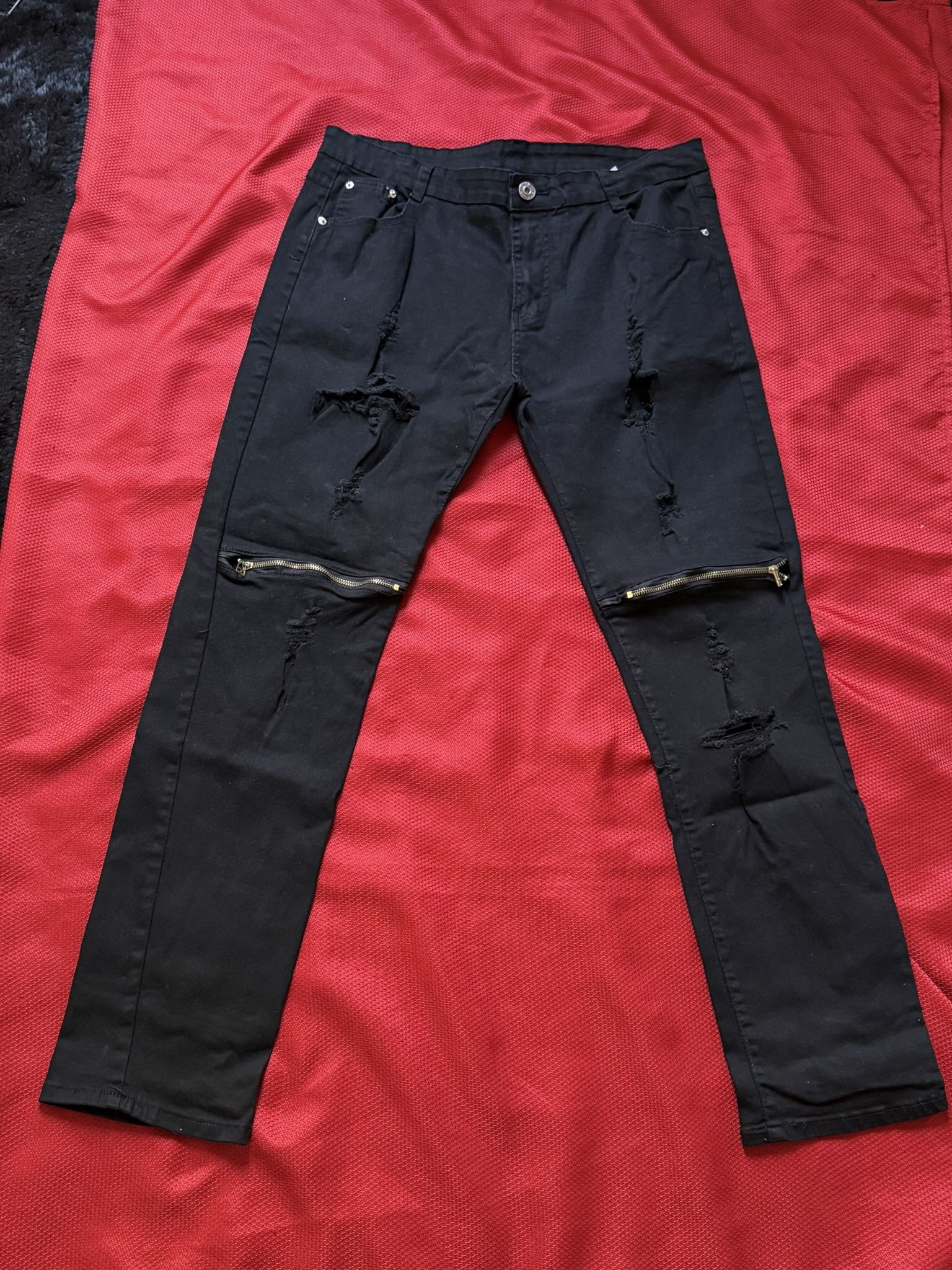 Mens Ripped Jeans by Qazel Vorrlon (Located in Woonsocket, RI)