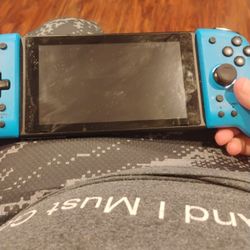 Fairly New Nintendo Switch With Custom Blue Grips 