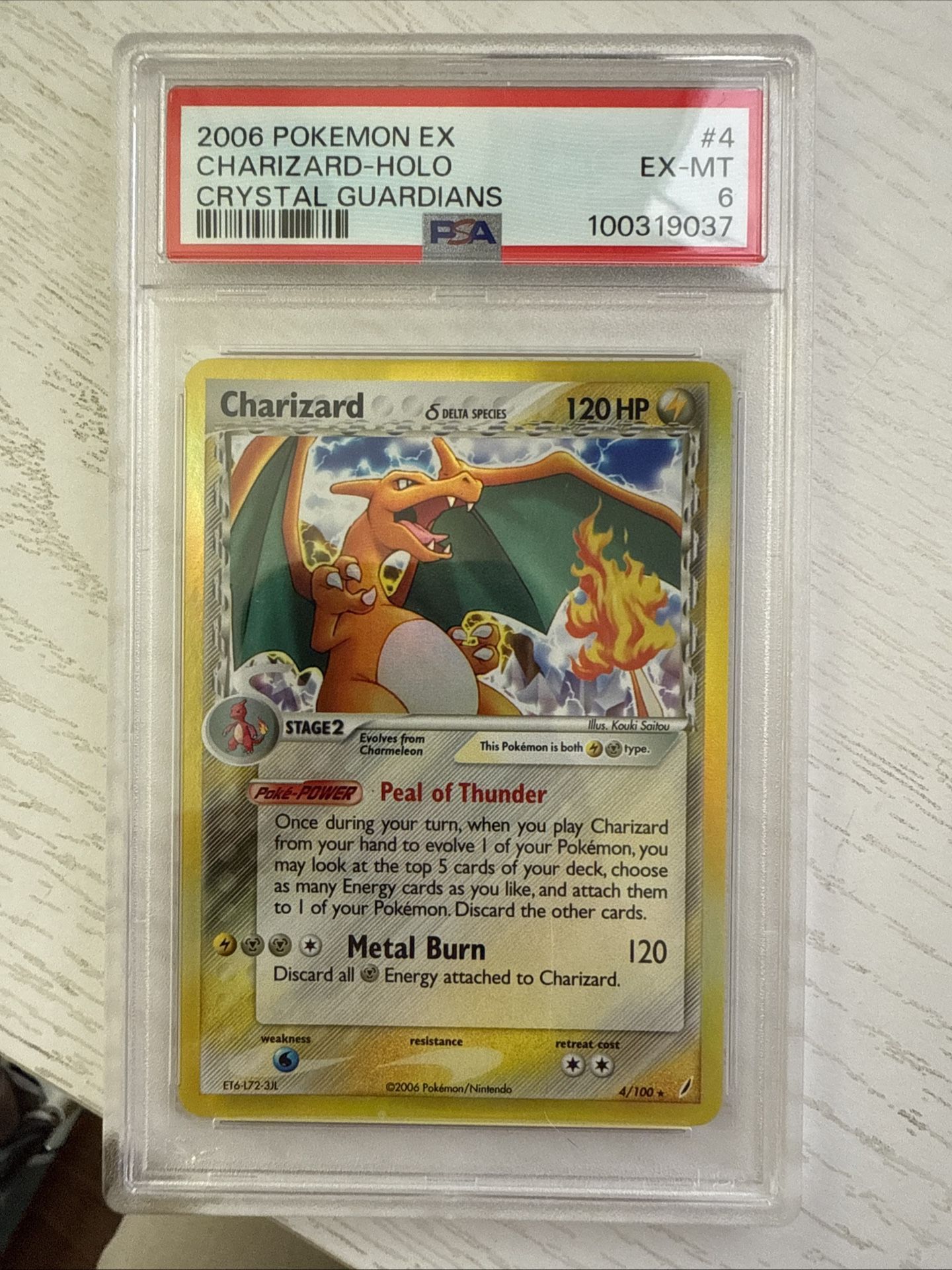 Charizard 4/100 Crystal Guardians PSA 6