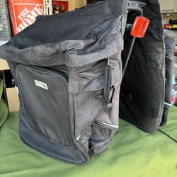 Black bicycle pannier bags, or as I call them saddlebags new never used with a rack