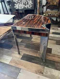 Stainless Steal And Amazing Wood With A Fabulous Finish From A Famous Designer 