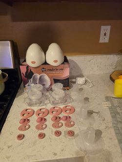 Electric hands free breast pump